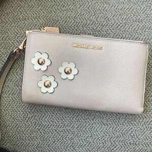 Used Michael Kors floral double zip wallet